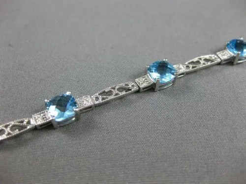 7.71CT DIAMOND & BLUE TOPAZ 14KT WHITE GOLD PAST PRESENT FUTURE TENNIS BRACELET