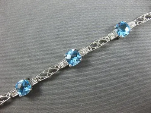 7.71CT DIAMOND & BLUE TOPAZ 14KT WHITE GOLD PAST PRESENT FUTURE TENNIS BRACELET