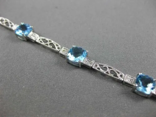 7.71CT DIAMOND & BLUE TOPAZ 14KT WHITE GOLD PAST PRESENT FUTURE TENNIS BRACELET